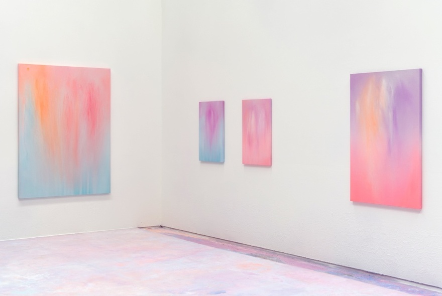 Painting of a white-walled gallery space hung with large abstract pastel-coloured artworks.