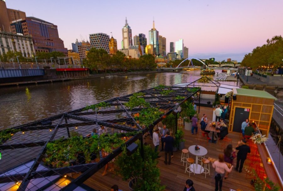 A plant-filled floating bar on the Yarra River in Melbourne.