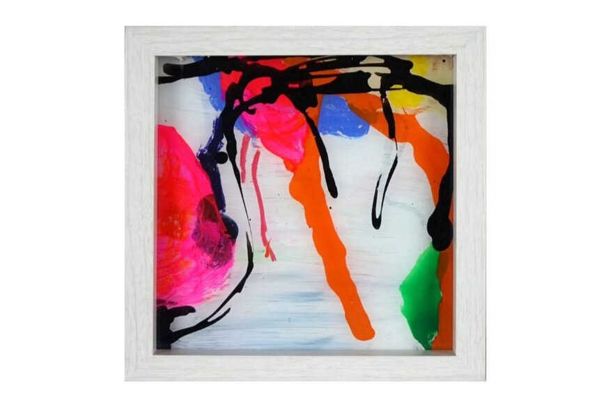 A brightly coloured abstract artwork hanging on a wall.