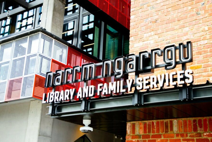 Signage outside a building that reads 'narrm ngarrgu Library and Family Services'.