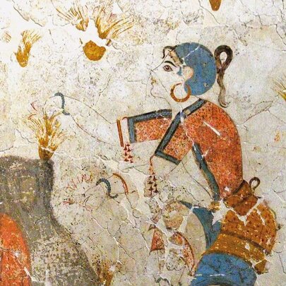 Ancient wall painting of a girl wearing jewellery.