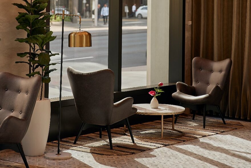 A cosy coffee table for two by a window with a street view. 