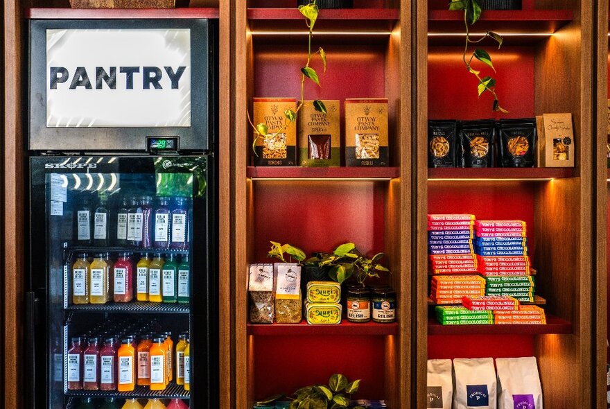 Shelves with items for sale and a sign saying 'PANTRY'.