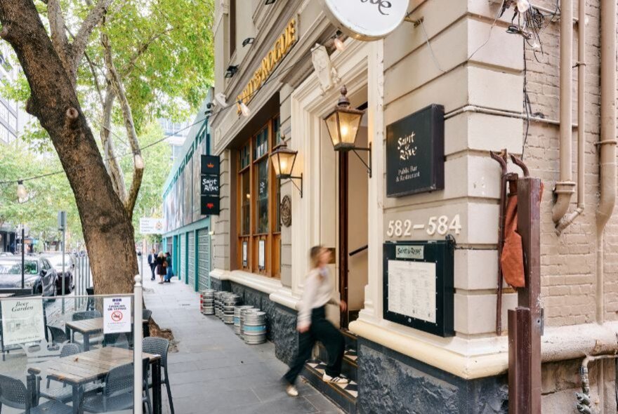 Exterior of Saint & Rogue, a grand, heritage-style building with light-coloured masonry and classic architectural details.