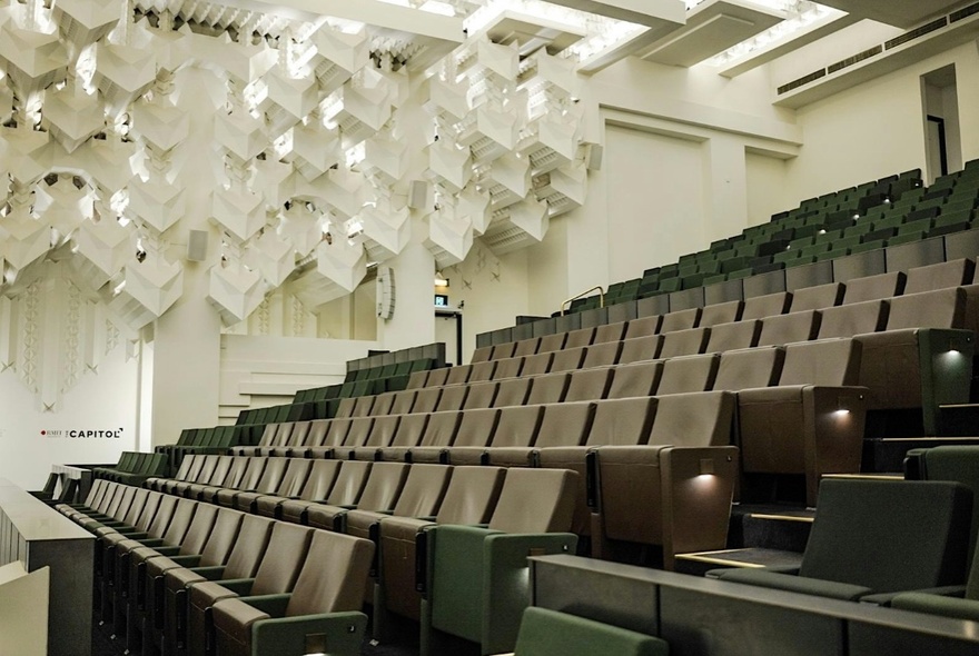 The auditorium at the Capitol Theater, looking back at the empty seats and geometric sound-proofing on the wall.