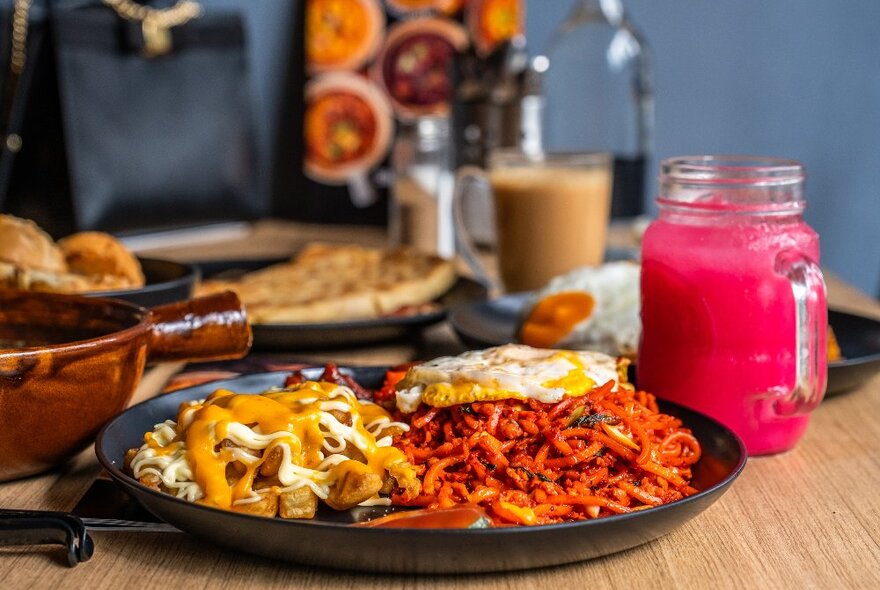 A plate of noodles and chips.