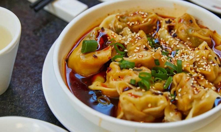 A plate of chilli oil dumplings