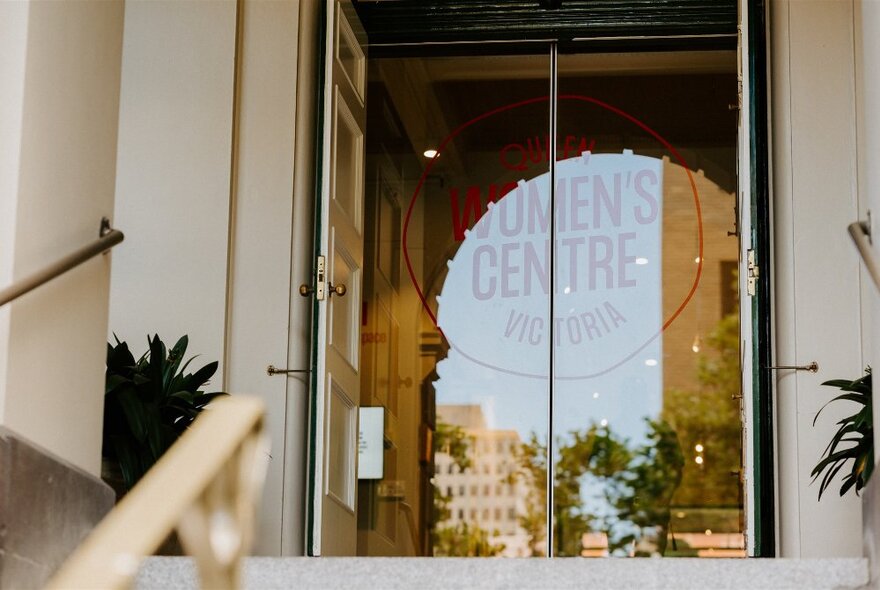 The glass doors at the entrance of the Queen Victoria Women's Centre.