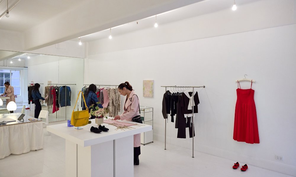 Women browsing in a clothing store.