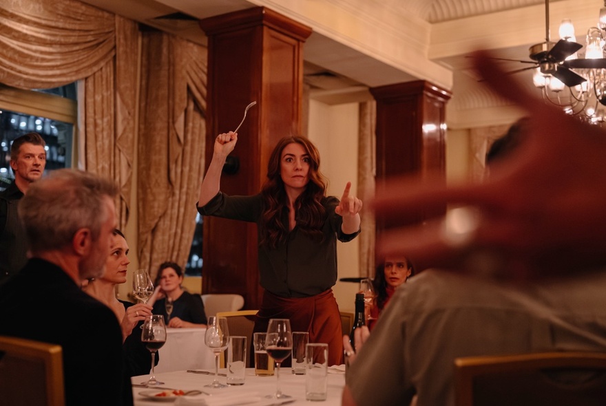 Actors performing in a play that takes place in a hotel dining room. 