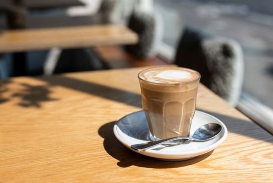 Latte coffee in a glass.