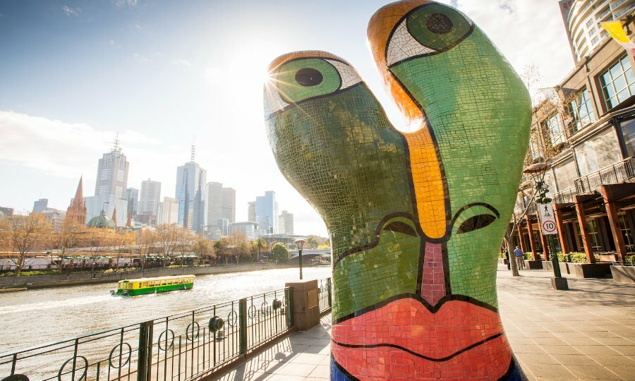 Brightly coloured statue by the waterfront.