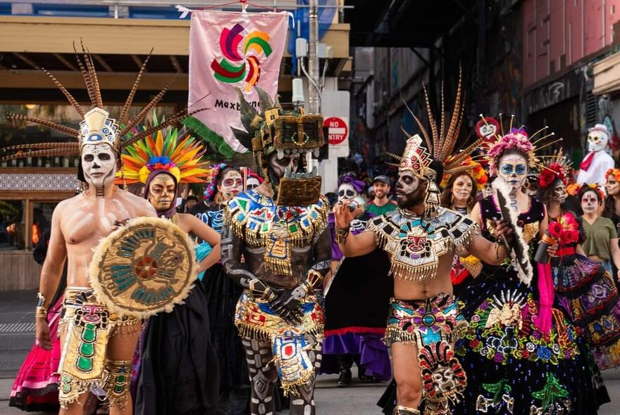 Day of the Dead performers in costume.