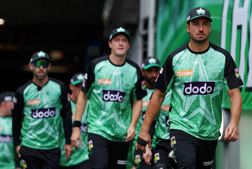 Melbourne Stars BBL players walking out on the pitch. 