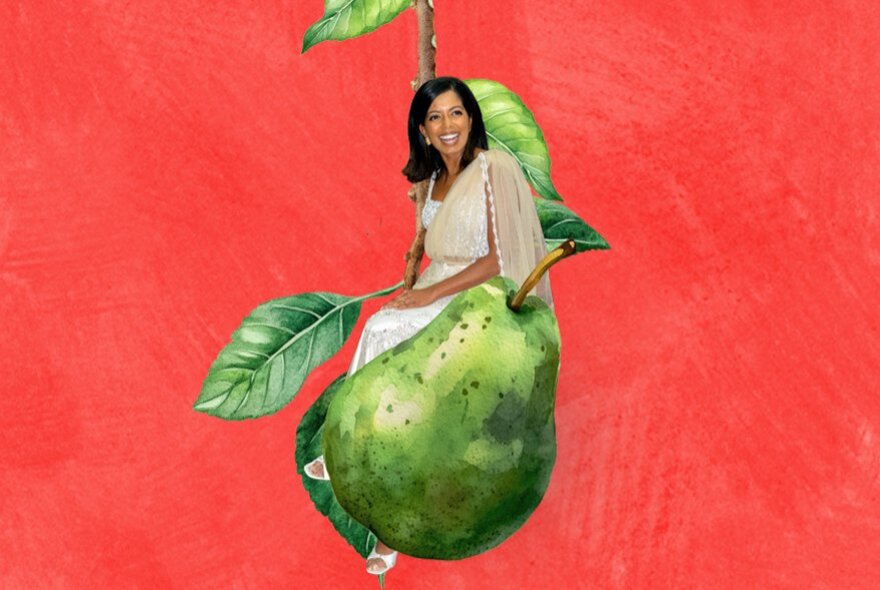 Comedian Sashi Perera, positioned sitting on a larger than life illustration of a green pear on a red background.