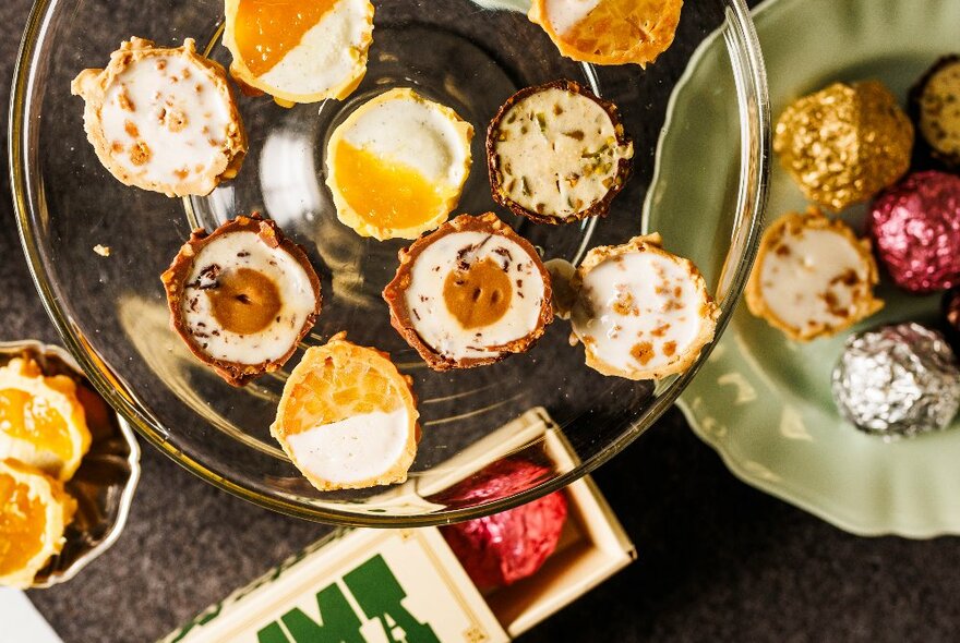 A selection of chocolates cut in half with different flavoured gelato inside.