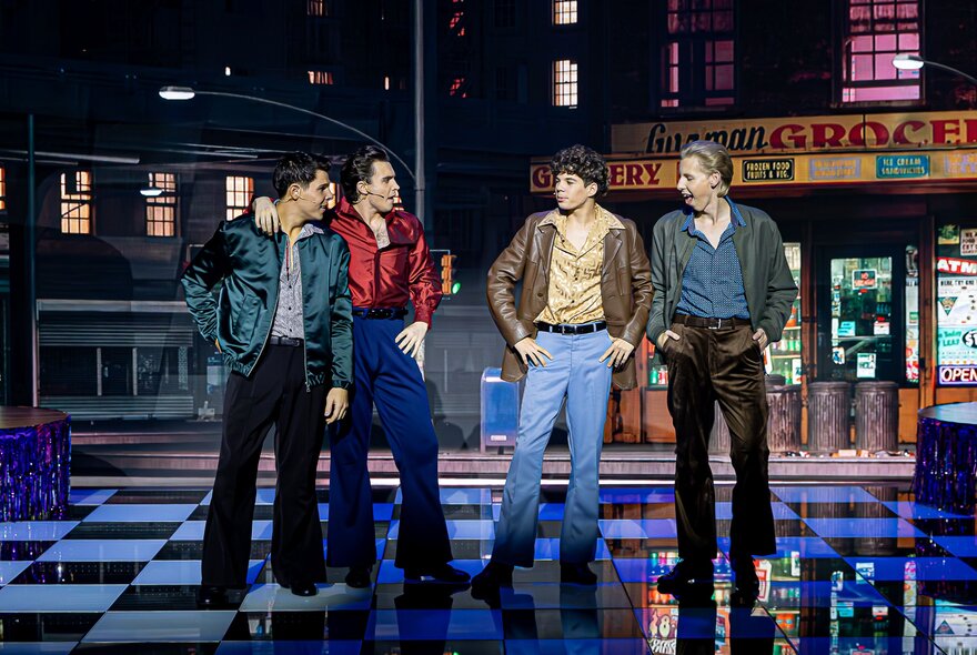 A group of four performers in a stage musical of Saturday Night Fever. 