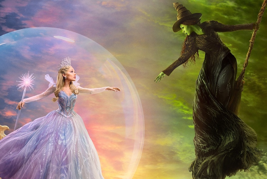 A still from the movie Wicked: For Good, with the two witches facing each other against a stormy sky.