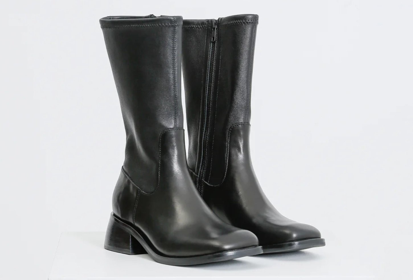 A pair of black leather boots