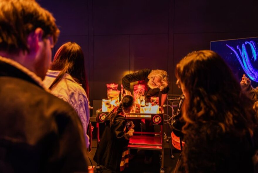 People at an after-hours museum experience. 