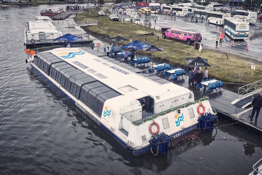 A cruise boat anchored at Flemington Racecourse.