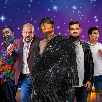 Five Asian comedians standing together in front a deep night sky with bright stars and a lit up city skyline.