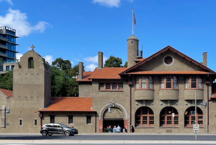 The exterior of historic Missions to Seafarers in Melbourne on a sunny day. 