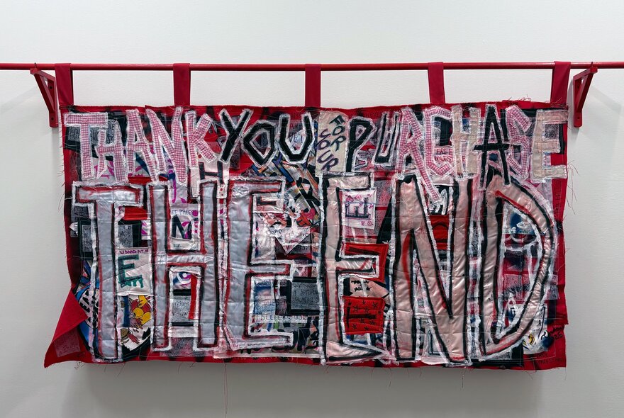 Slogan-style artwork with letters and words on linen canvas.