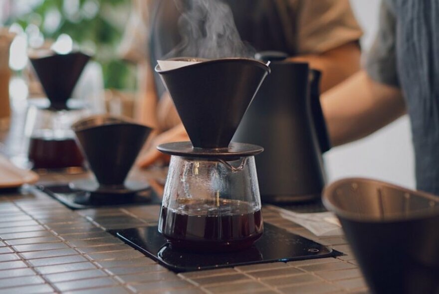 A steaming pot of filter coffee