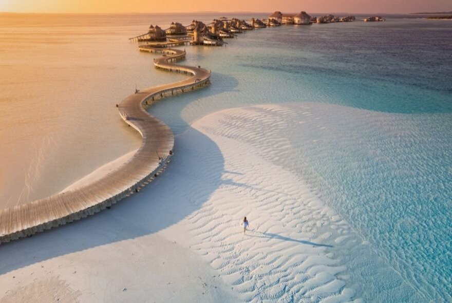 Undulating walkway on remote sand dunes.