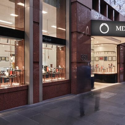 Jewellery store facade with window displays and signage.