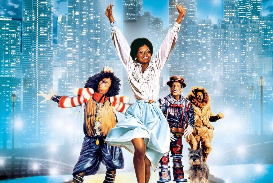 A movie poster from The Wiz, showing characters dancing in front of a stylised city skyline. 