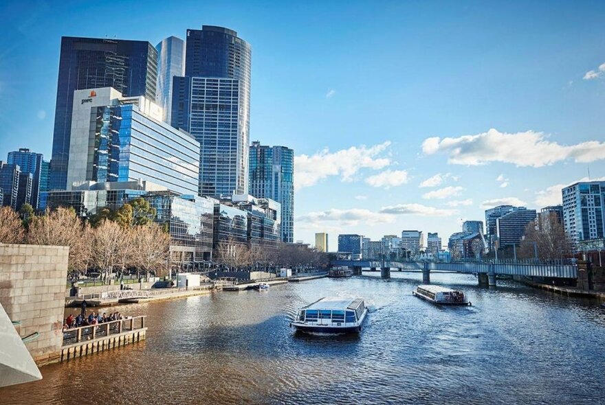 View of the Yarra River and Melbourne CBD buildings. 