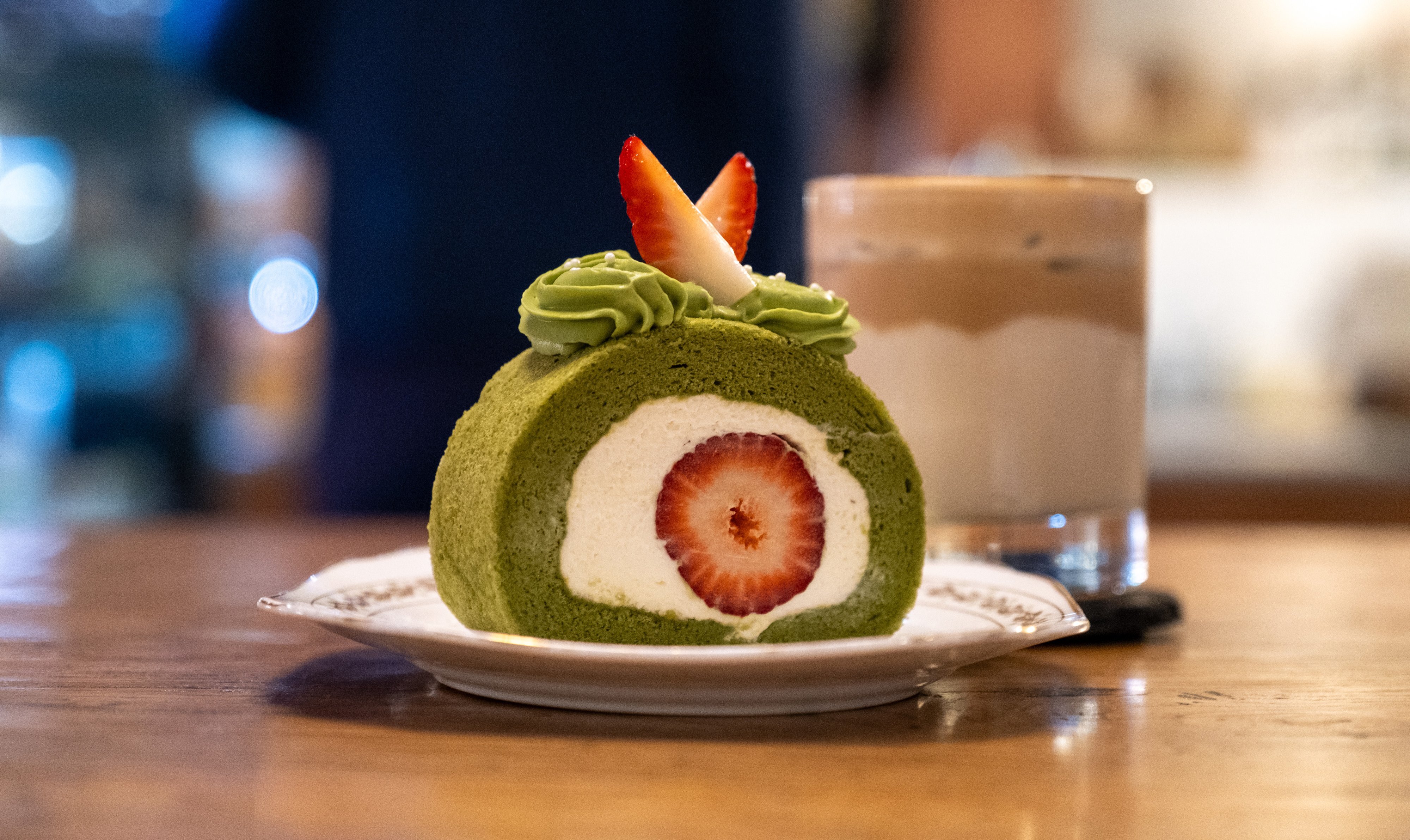 A matcha strawberry swiss roll.