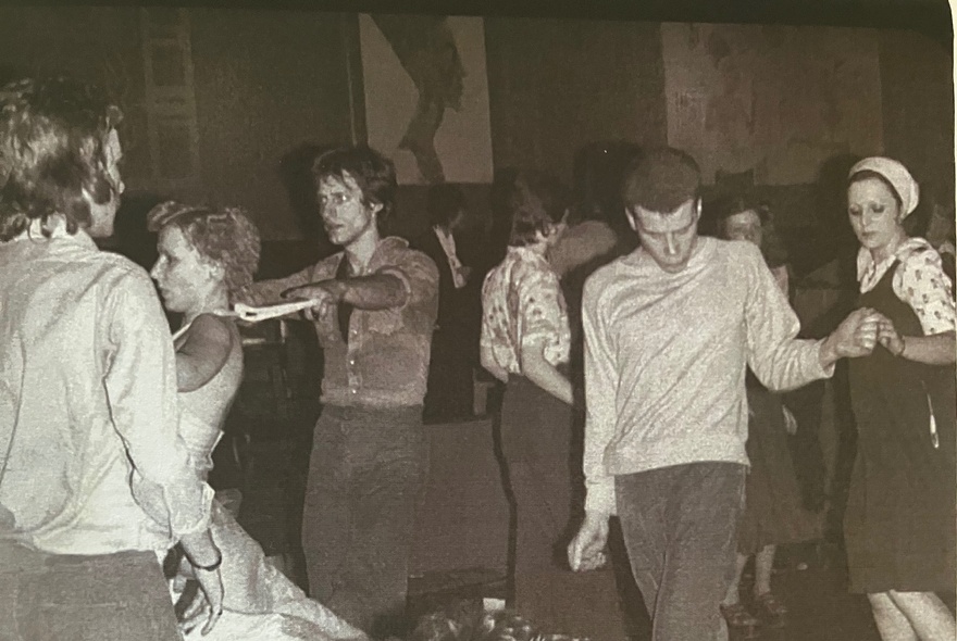 Vintage black-and-white photograph of young people dancing at a dance event, reminiscent of the energetic club scenes of the 1960s or 1970s.