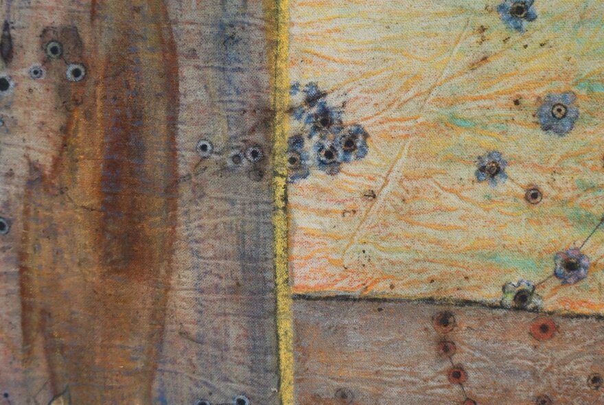 An abstract print in natural tones of pale yellows and tan.