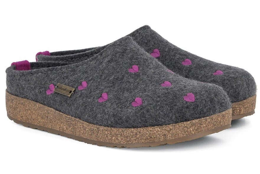 A pair of grey felt clog style slippers with a cork base and embroidered purple hearts.