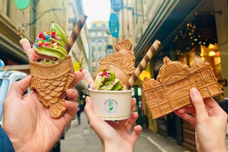 Waffles shaped like Flinders Street Station and fish topped with matcha ice cream and sprinkles.