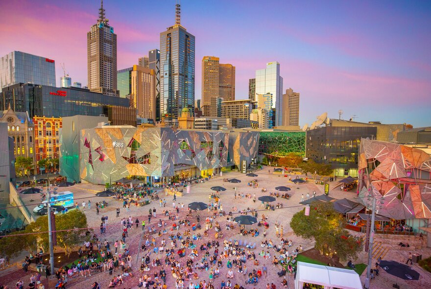 A aerial view of Federation square at sunset