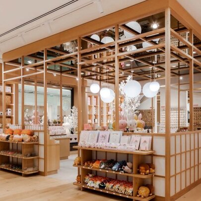 Exterior of the Meeq store with wood panelling. 