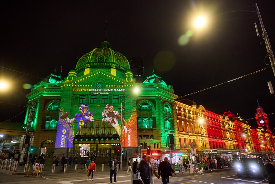 Flinders Street Station illuminated at night.