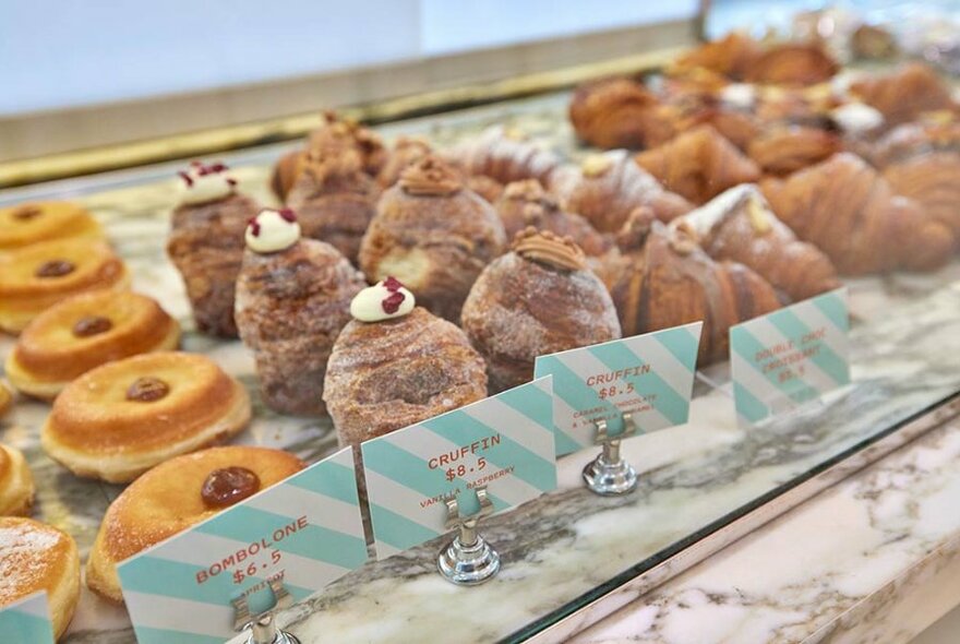 Italian pastries: bombolone and cruffins.