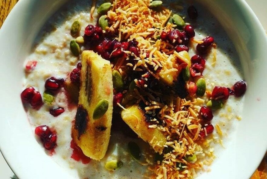 Bowl of muesli with fruit and yoghurt.