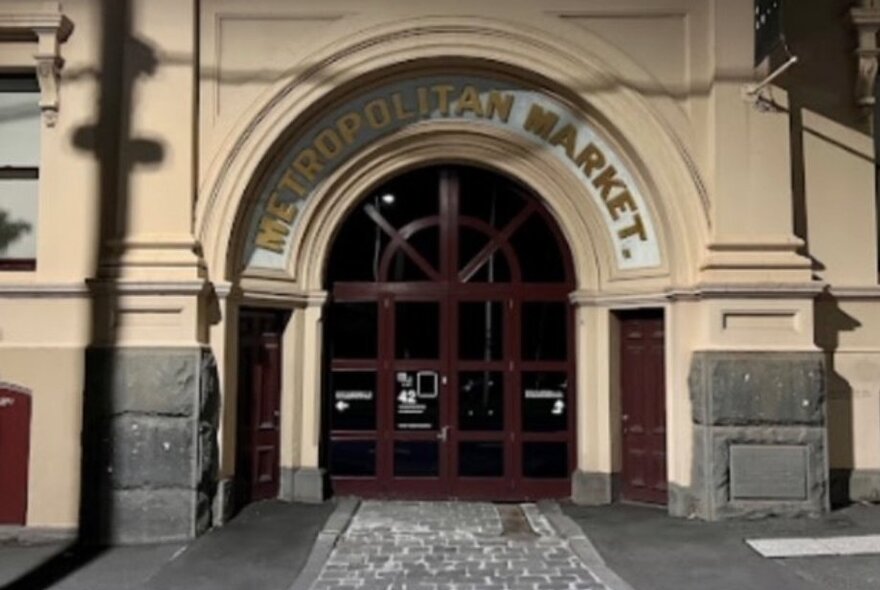 The arched entry to the historic Meat Market building.