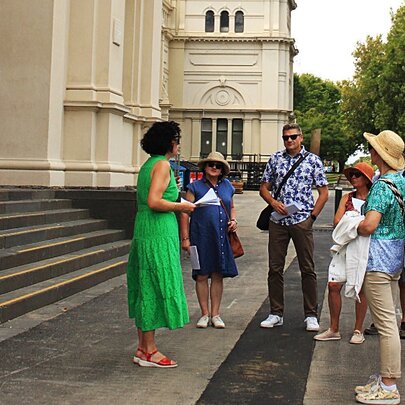 Tour group standing on the steps of the Royal Exhibition Building.