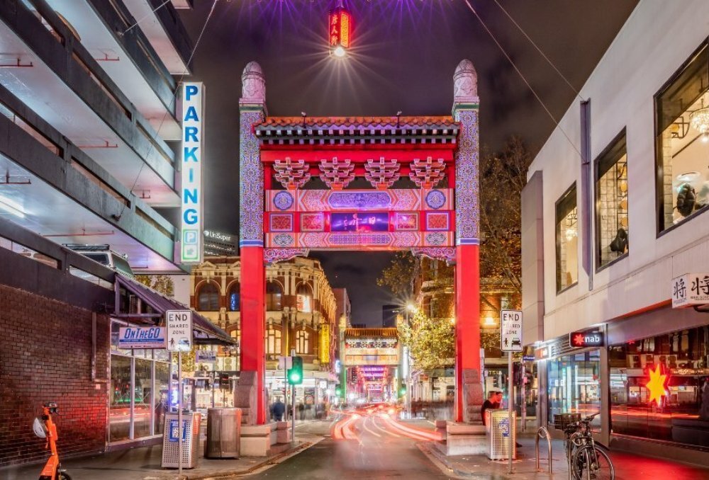 Image of red gates that start the Chinatown strip.