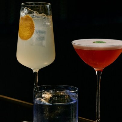 A group of three cocktails.