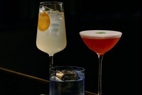 A group of three cocktails.