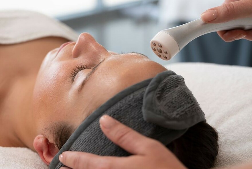 Woman having facial.