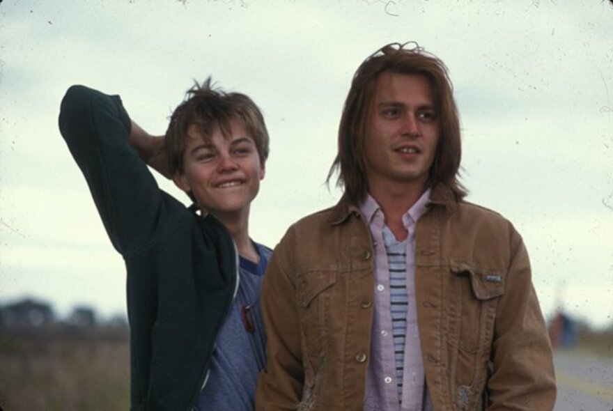 A still from the movie, What's Eating Gilbert Grape, showing Johnnie Depp and Leonardo Di Caprio in character as Gilbert and his developmentally disabled brother.